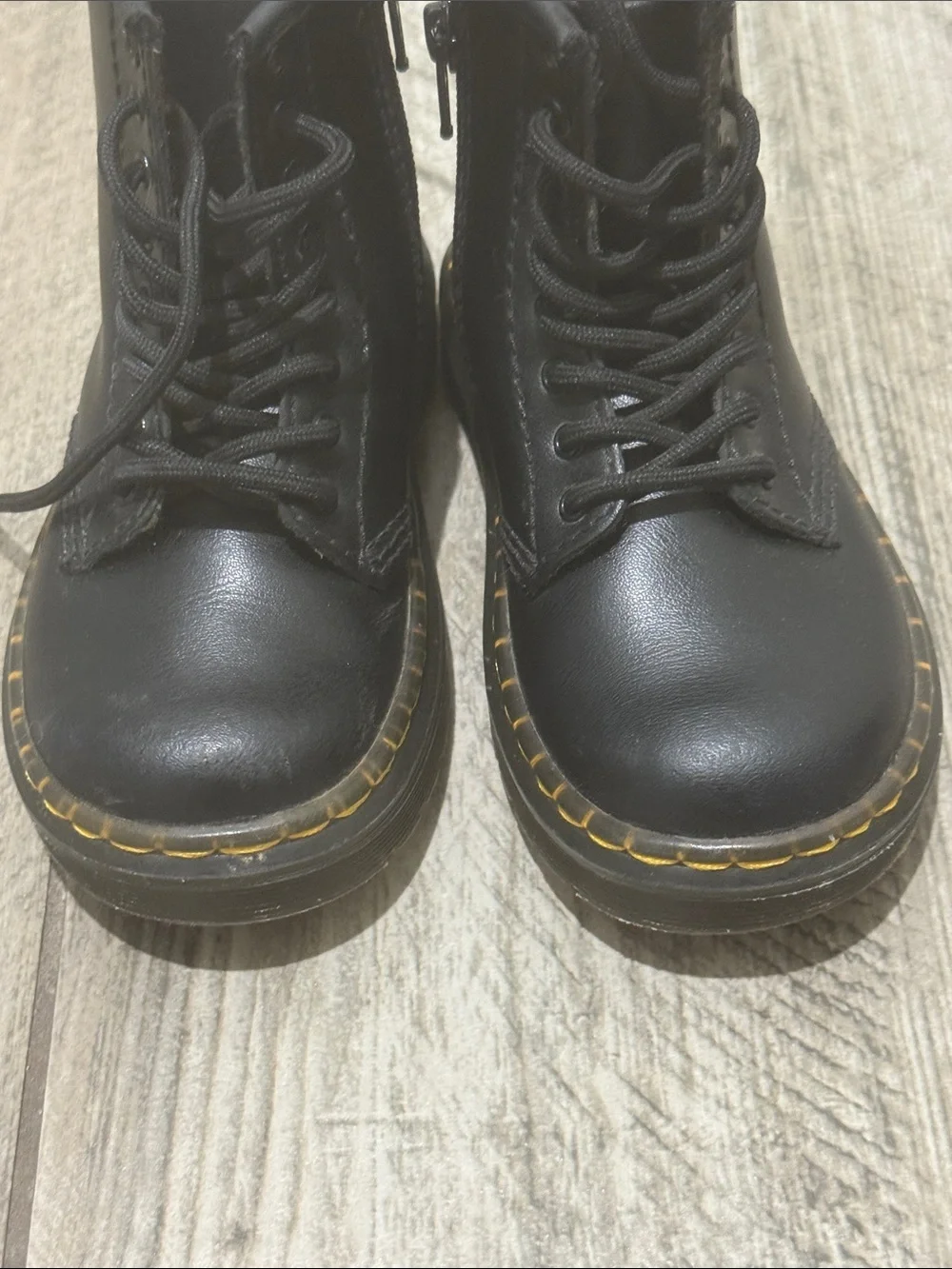 Dr. Martens Kids Black Lace-Up Boots with Yellow Stitching